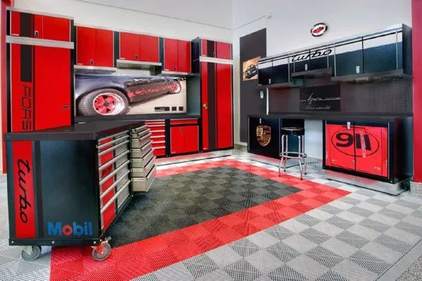 Custom garage buildout with finished storage and tool walls